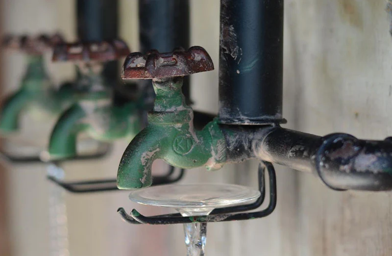 Three Spigot Wine Holder