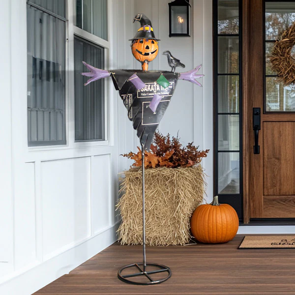Recycled Metal Scarecrow on a Stand