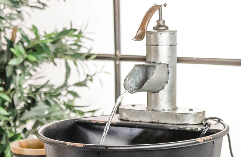 Distressed Water Pump Fountain